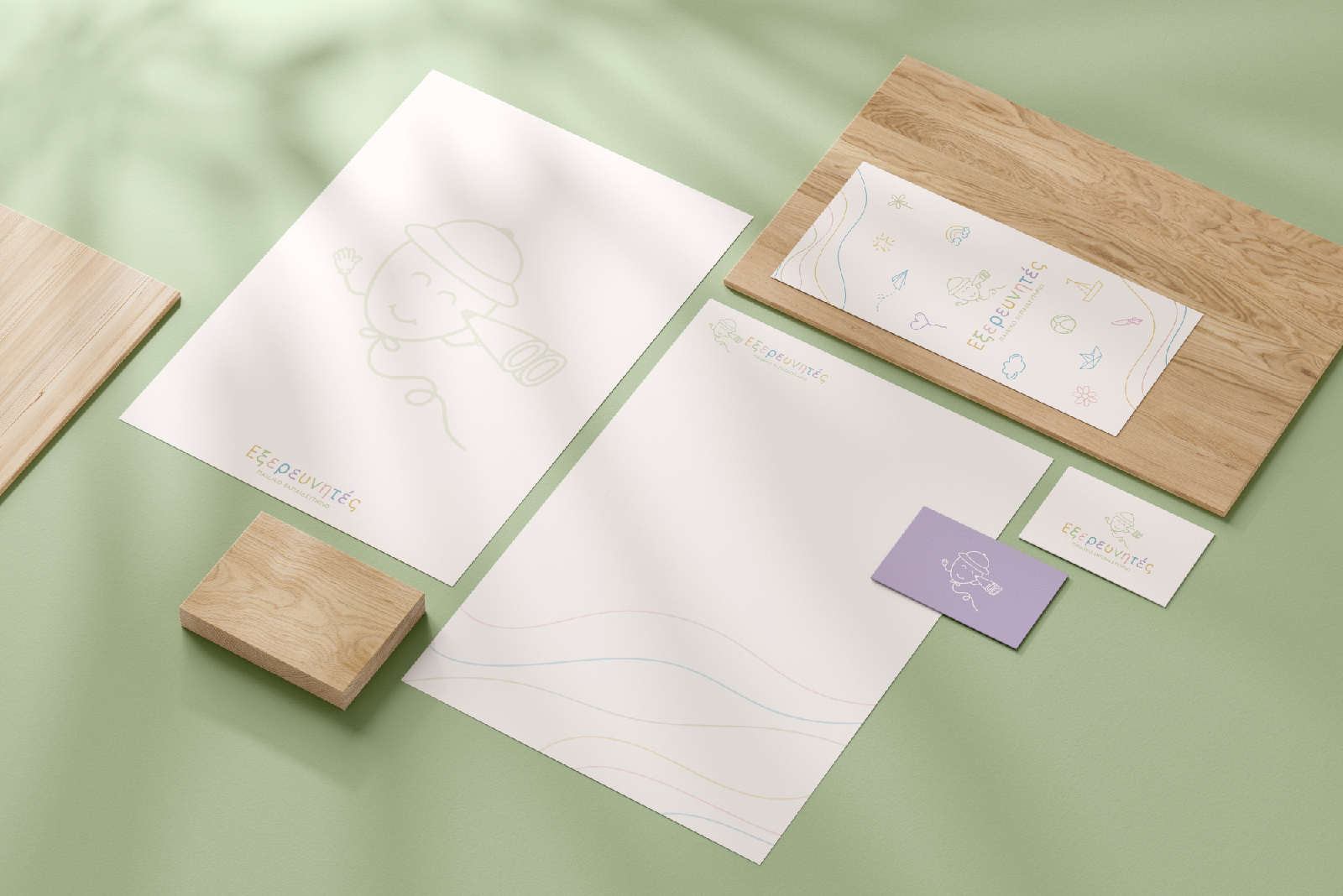EXEREYNHTES paidikos stathmos logo branding